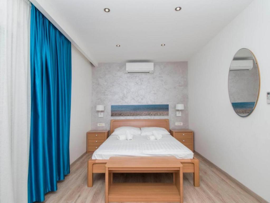 Postel nebo postele na pokoji v ubytování Apartments Antonio