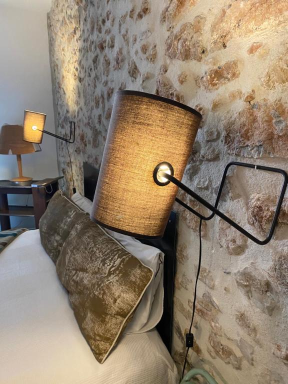 Postel nebo postele na pokoji v ubytování Pitibi Maison d'Hote