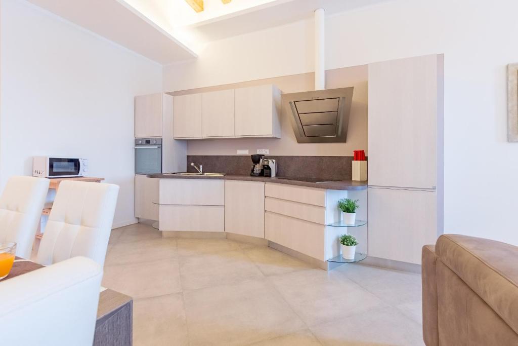 Kuchnia lub aneks kuchenny w obiekcie Zanardelli 1 Apartment by Wonderful Italy