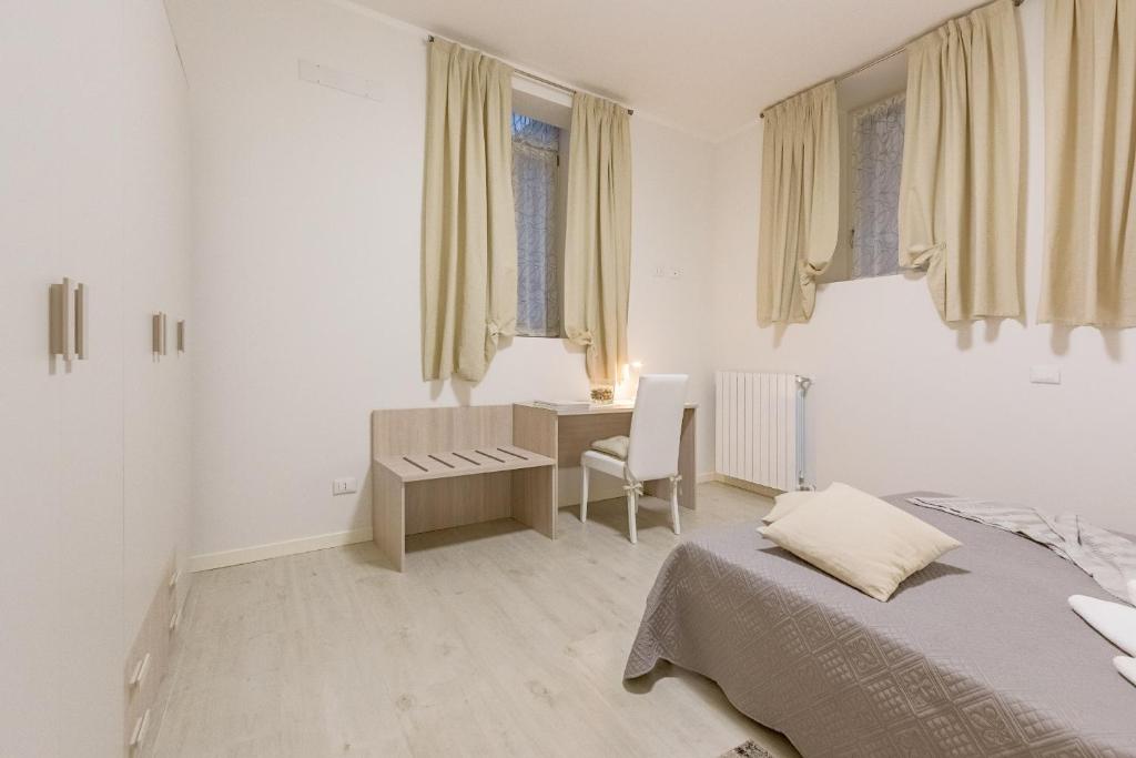 Łóżko lub łóżka w pokoju w obiekcie Zanardelli 1 Apartment by Wonderful Italy