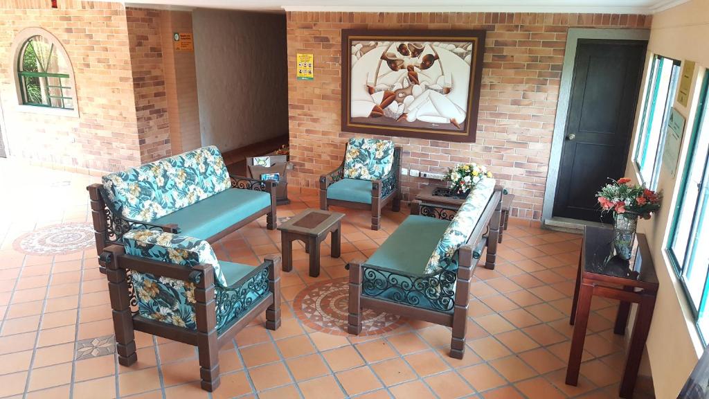 Posezení v ubytování Hotel Palmera Real