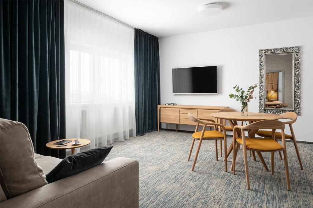 TV a/nebo společenská místnost v ubytování Hotel Osvit