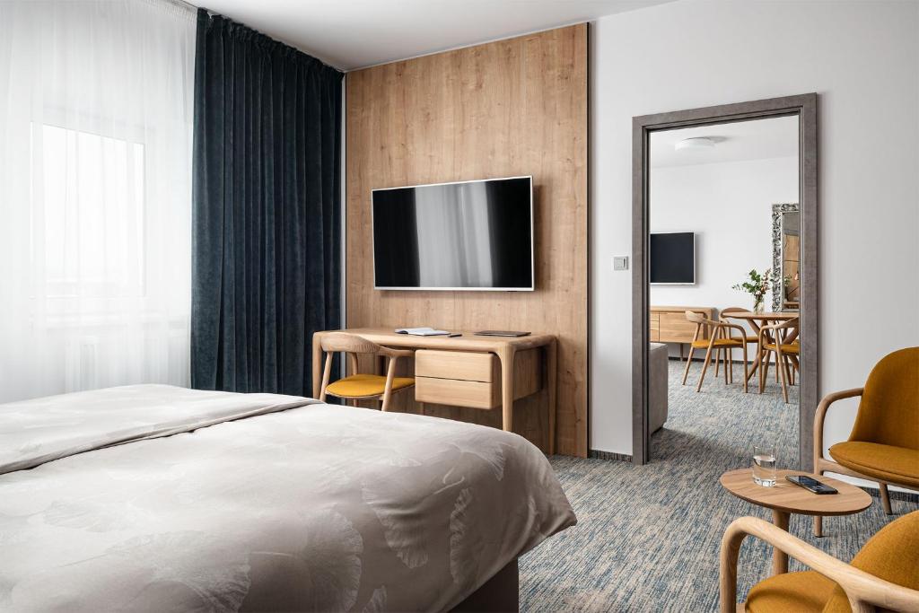 TV a/nebo společenská místnost v ubytování Hotel Osvit