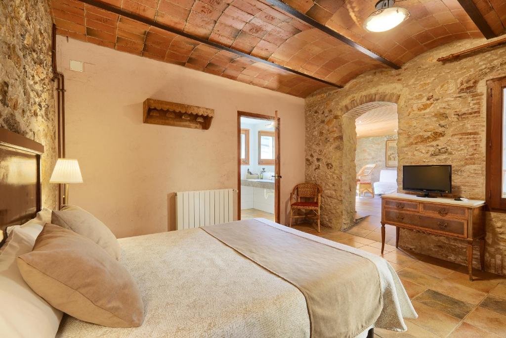 Postel nebo postele na pokoji v ubytování Can Barnosell - Els Masos d'en Coll