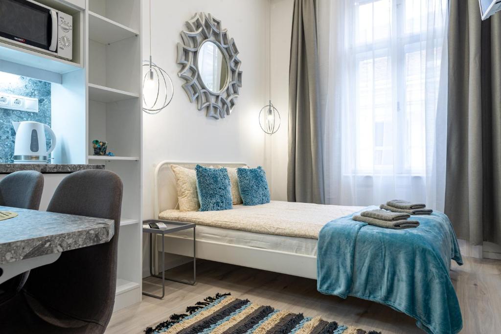 Postel nebo postele na pokoji v ubytování Budapest Holidays Harmony