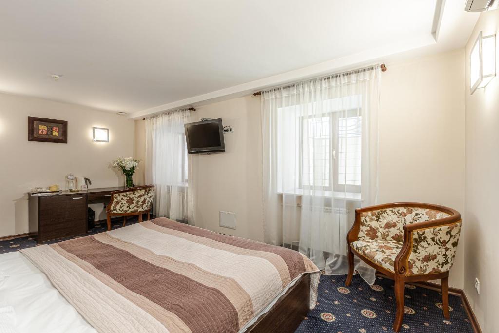 Postel nebo postele na pokoji v ubytování Incognito Boutique Hotel