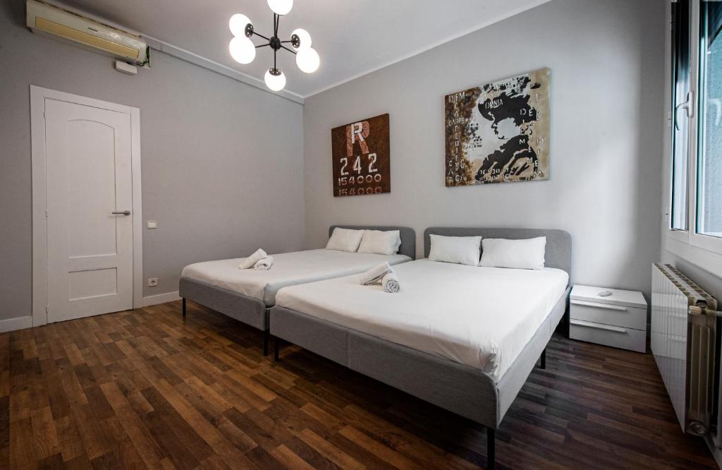 Llit o llits en una habitació de Design apartment Sagrada familia