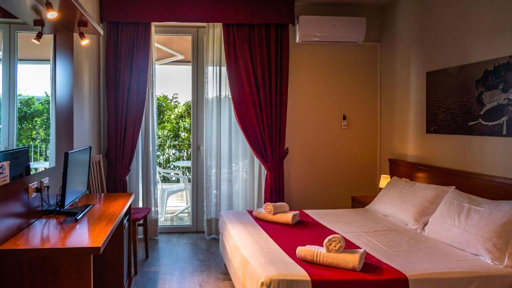 Postel nebo postele na pokoji v ubytování Hotel Venezia Park - ENJOY HOLIDAY
