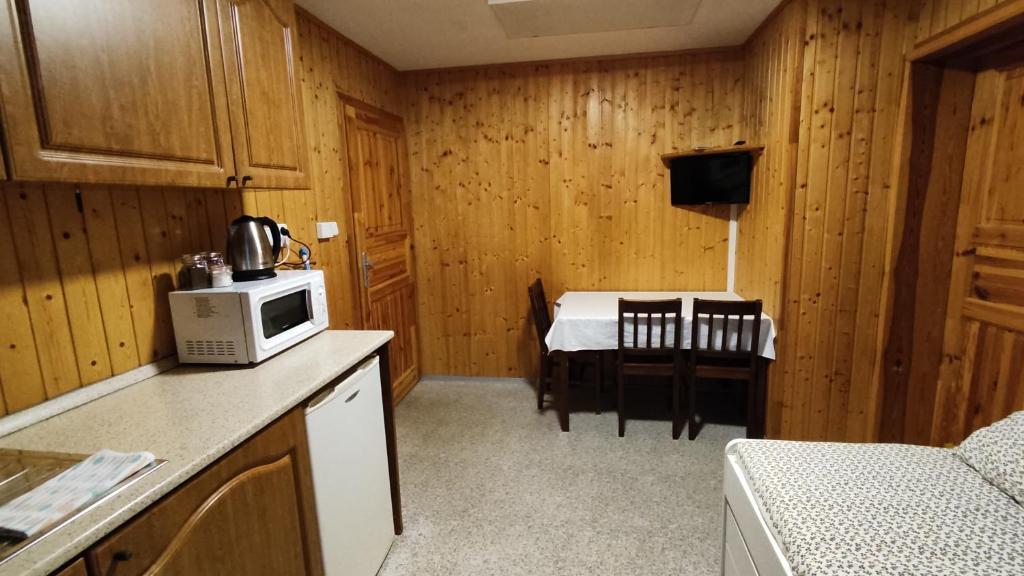 Kuchyň nebo kuchyňský kout v ubytování Penzion apartmány Aninka