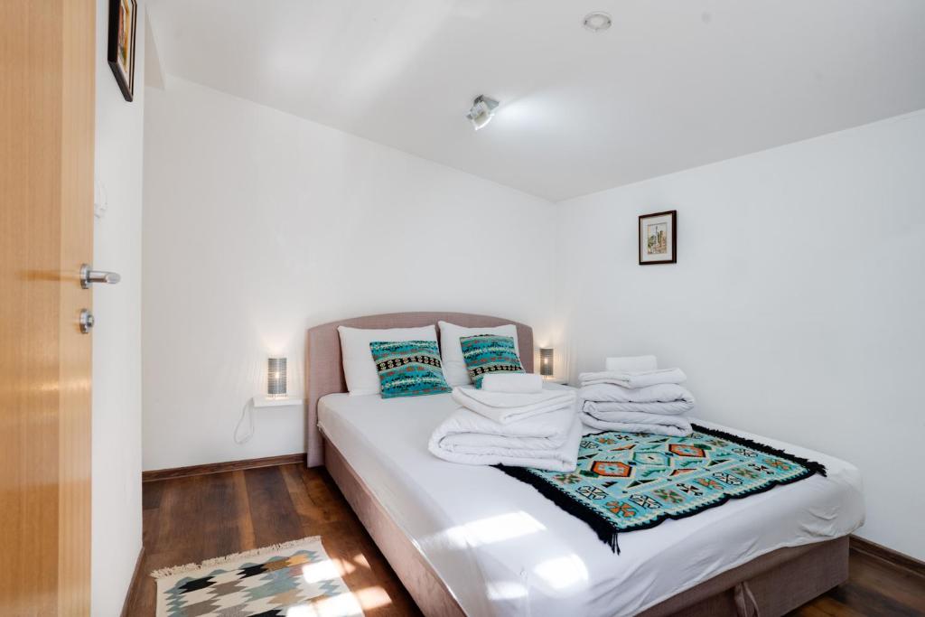 Postel nebo postele na pokoji v ubytování Hotel Vamos Sarajevo, b&b