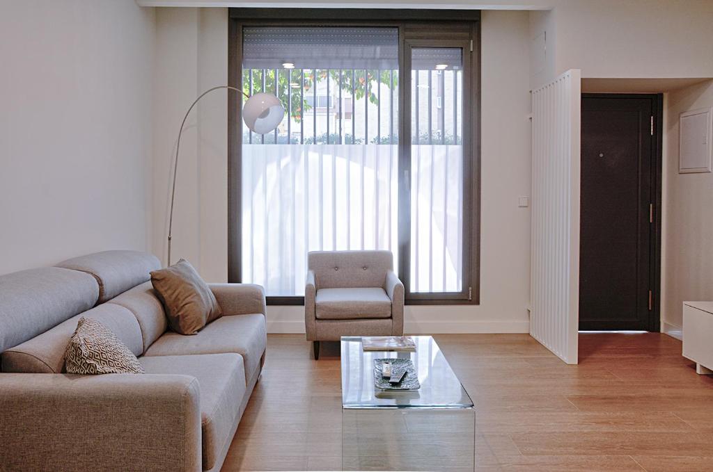 Posezení v ubytování Apartamento de dos dormitorios en Triana