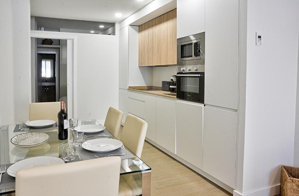 Kuchyň nebo kuchyňský kout v ubytování Apartamento de dos dormitorios en Triana
