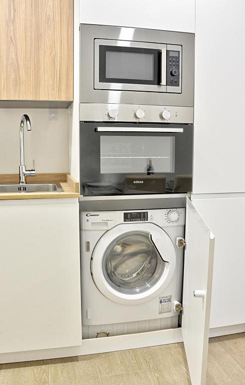 Kuchyň nebo kuchyňský kout v ubytování Apartamento de dos dormitorios en Triana