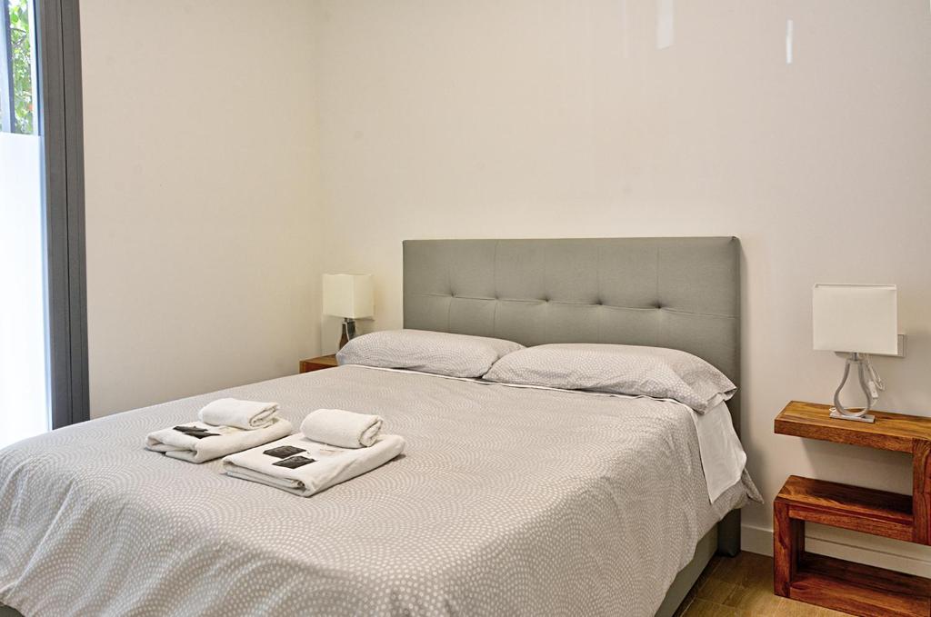 Postel nebo postele na pokoji v ubytování Apartamento de dos dormitorios en Triana