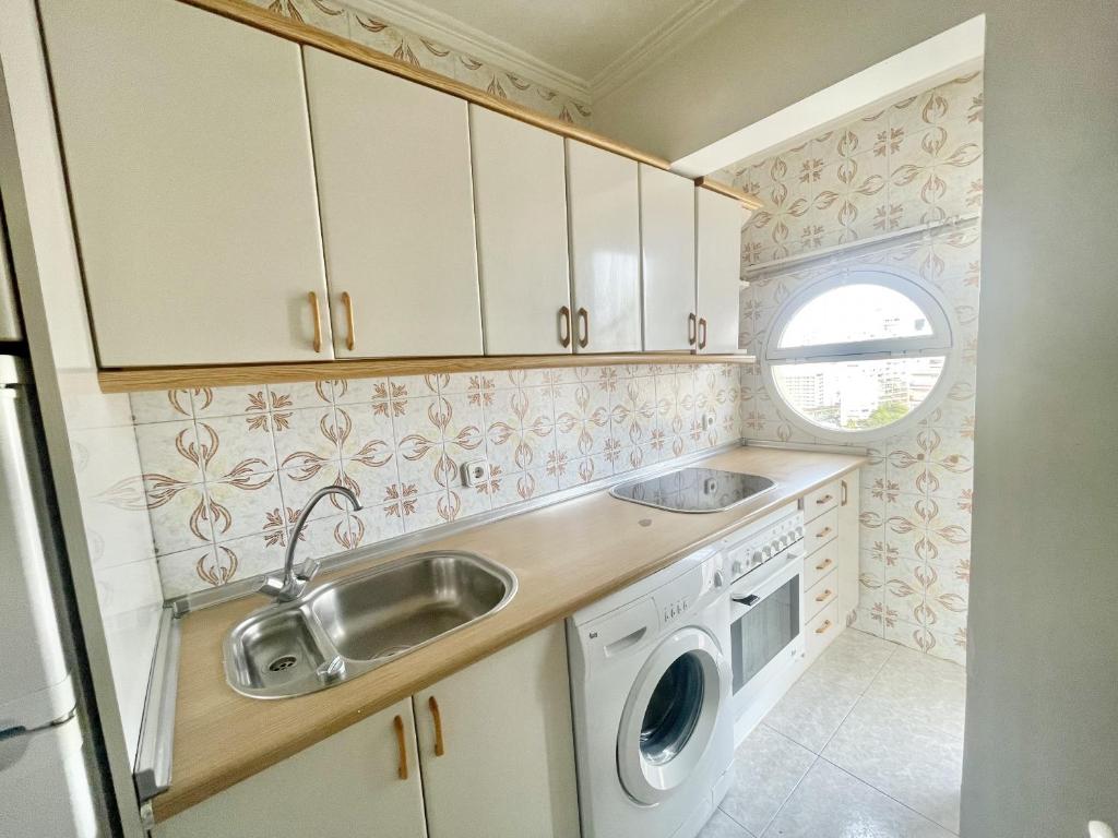 A kitchen or kitchenette at Caballos Apartment
