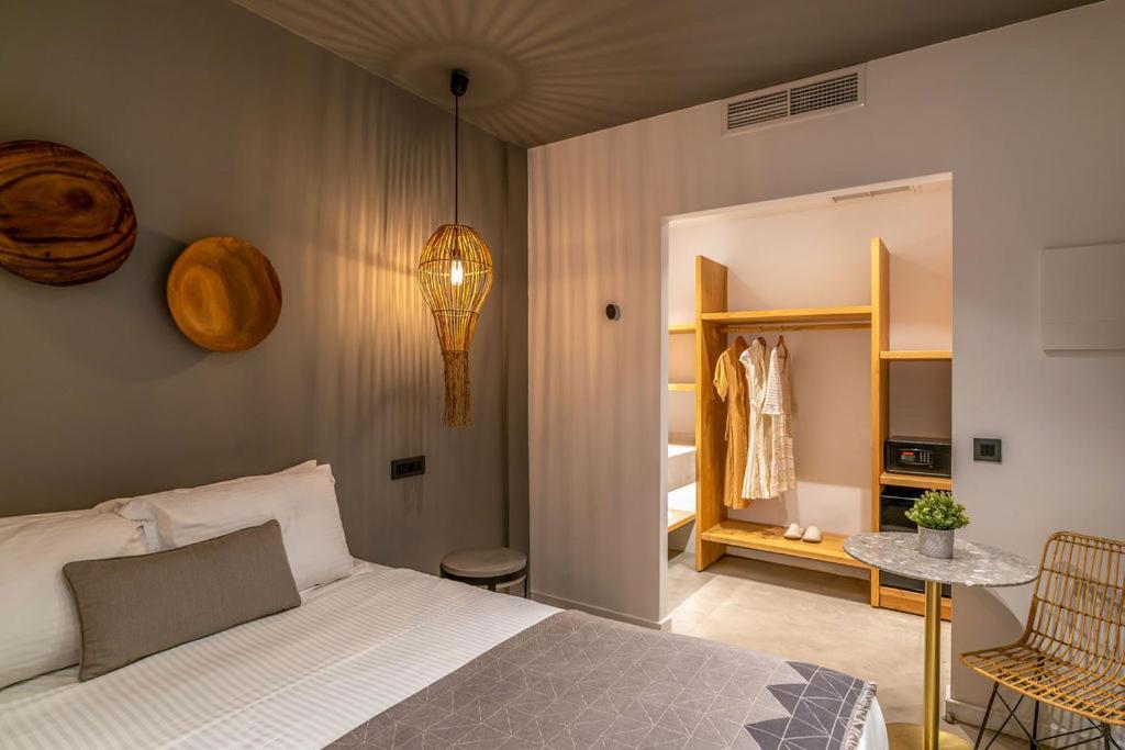 Postel nebo postele na pokoji v ubytování Lemon Suites Santorini