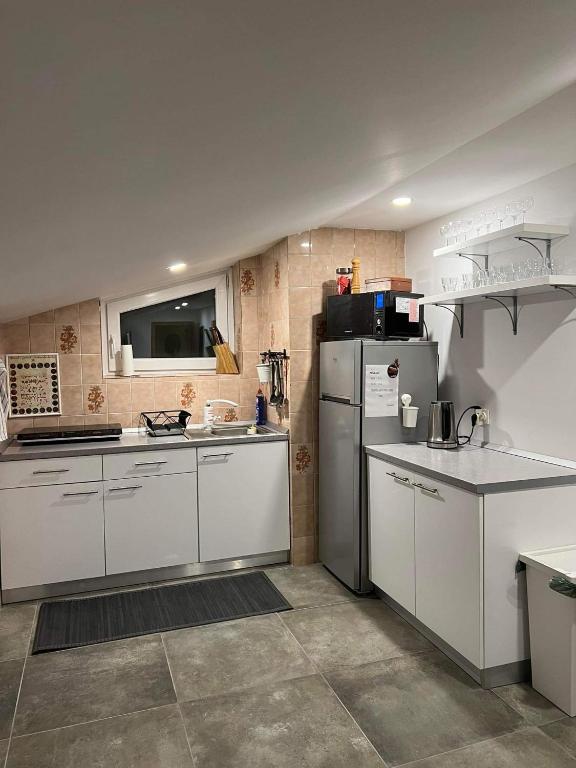 Kuchyň nebo kuchyňský kout v ubytování apartma "happy Scotts"