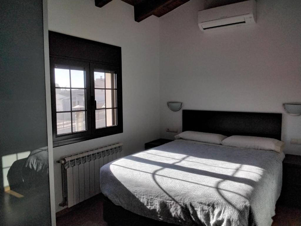 Postel nebo postele na pokoji v ubytování Casa Paca