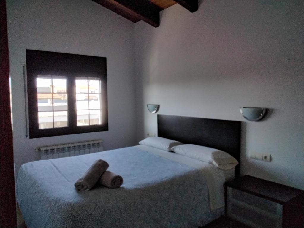 Postel nebo postele na pokoji v ubytování Casa Paca