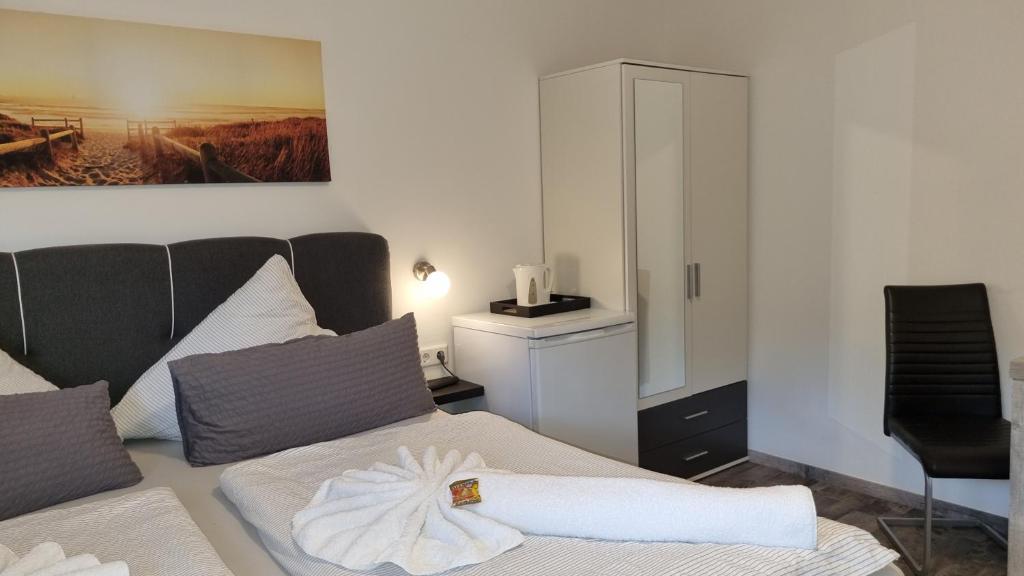 Ένα ή περισσότερα κρεβάτια σε δωμάτιο στο Pension Likedeeler