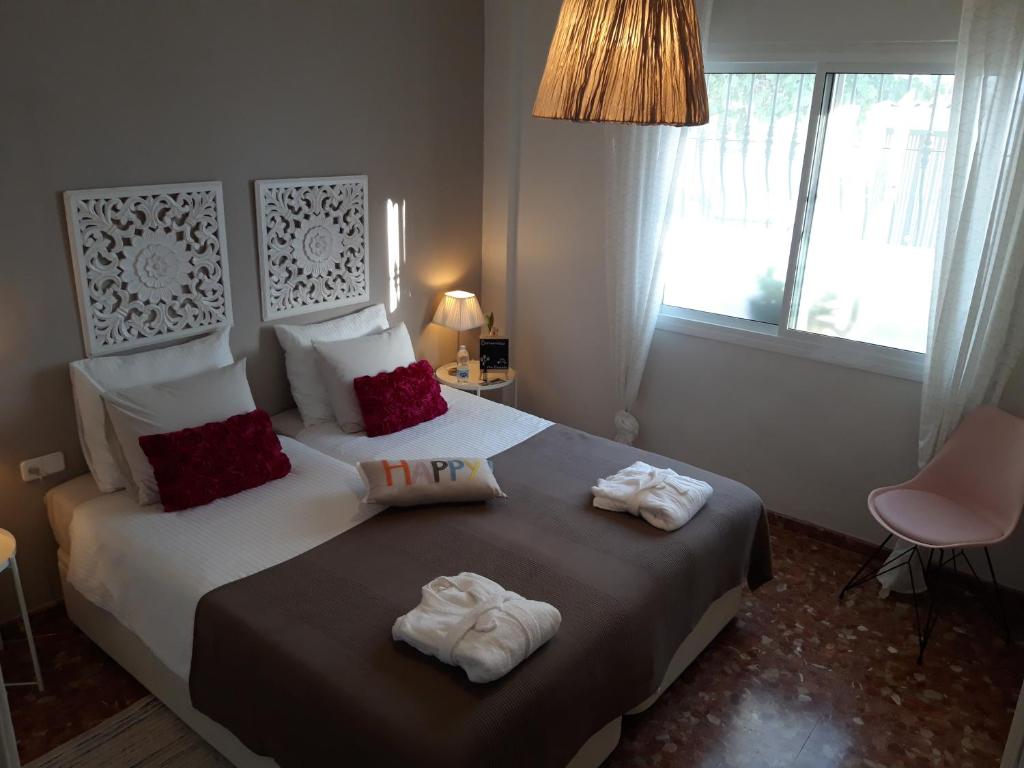 Postel nebo postele na pokoji v ubytování B&B Villa Deseada