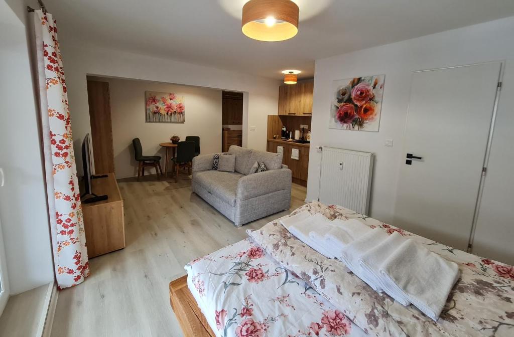 A bed or beds in a room at Apartmán FILIP