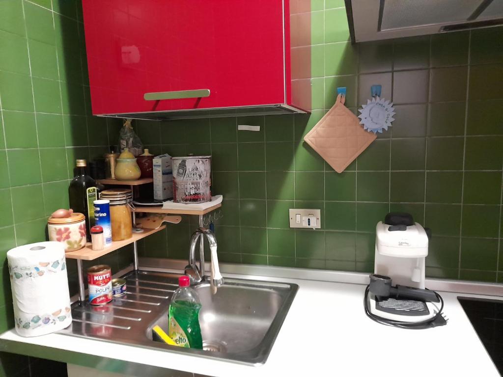 Kuchyň nebo kuchyňský kout v ubytování CASA DI SOLE Appartamento a Crema
