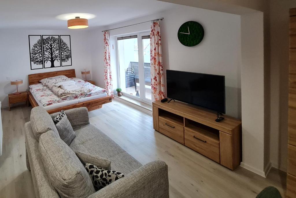 A television and/or entertainment centre at Apartmán FILIP