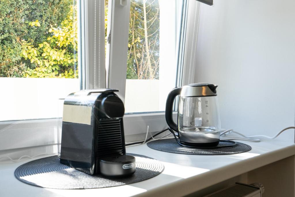Kuchyň nebo kuchyňský kout v ubytování revLIVING Apartments Eggenburg