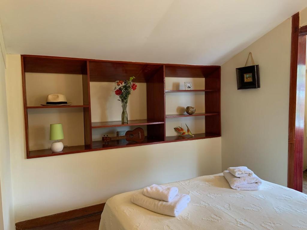 Llit o llits en una habitació de Gran Hotel Bahia
