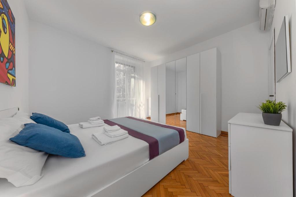 Łóżko lub łóżka w pokoju w obiekcie Casa da Suite Inventa
