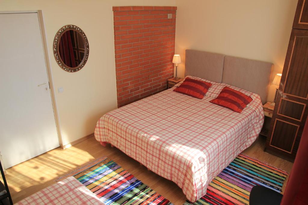 Postel nebo postele na pokoji v ubytování Peipsi Lake House