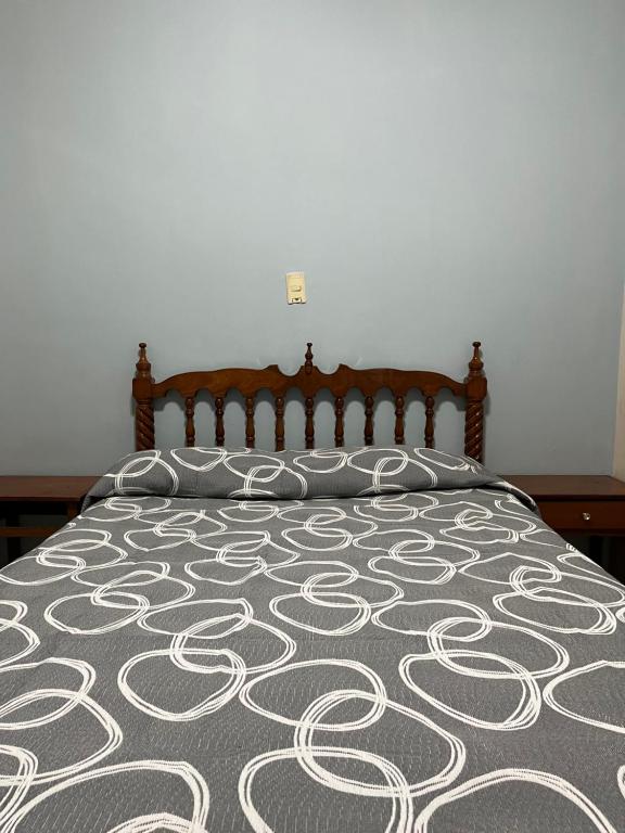 Postel nebo postele na pokoji v ubytování Hotel Paris