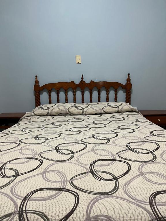 Postel nebo postele na pokoji v ubytování Hotel Paris