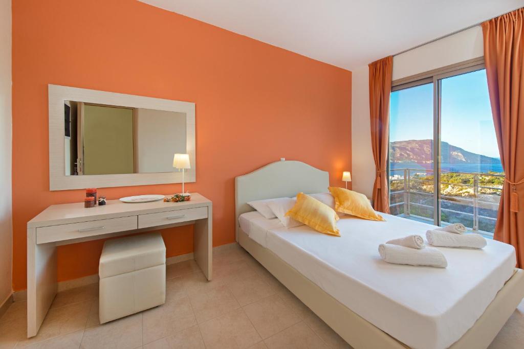 Postel nebo postele na pokoji v ubytování Renata's Villas
