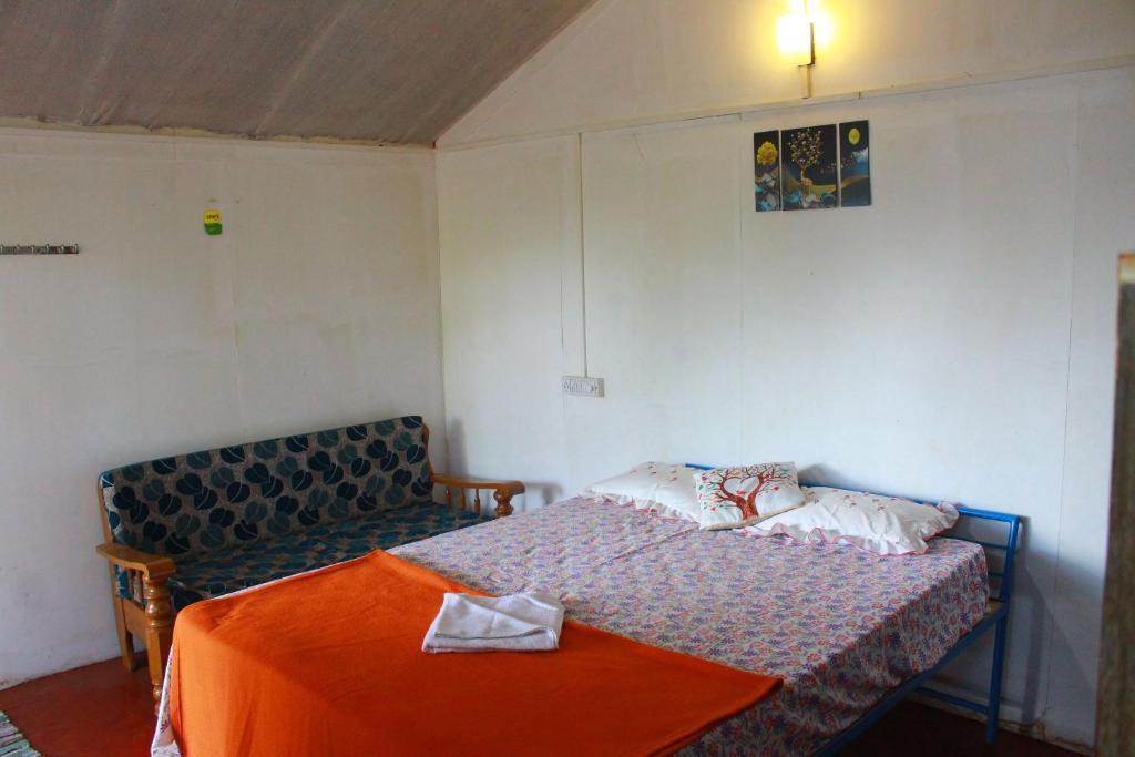 Voodi või voodid majutusasutuse SHIV SAI HUTS toas