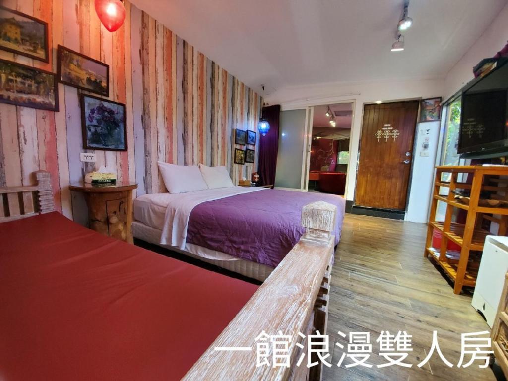 Postel nebo postele na pokoji v ubytování 墾丁牧場Villa Kenting Pasture - Villa B&B