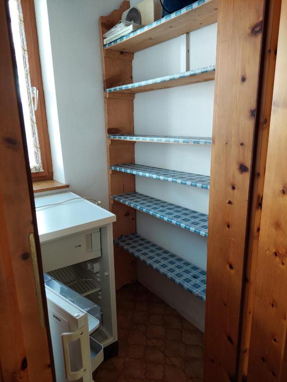 Palanda nebo palandy na pokoji v ubytování Ferienwohnung Muhlbauer
