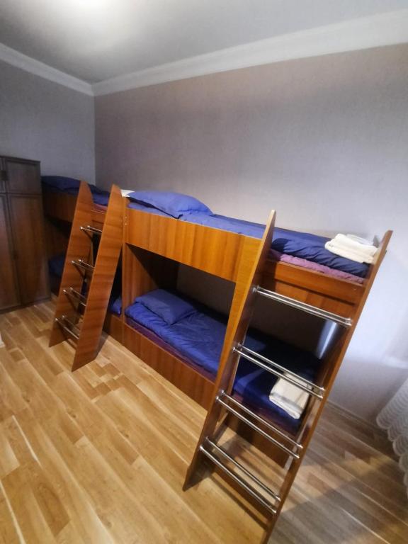 Postel nebo postele na pokoji v ubytování Brothers khutsishvili wine cellar