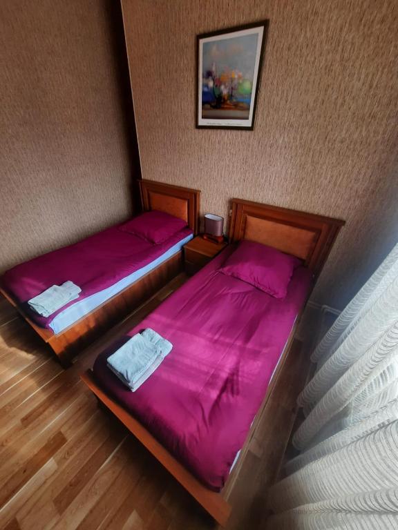 Postel nebo postele na pokoji v ubytování Brothers khutsishvili wine cellar