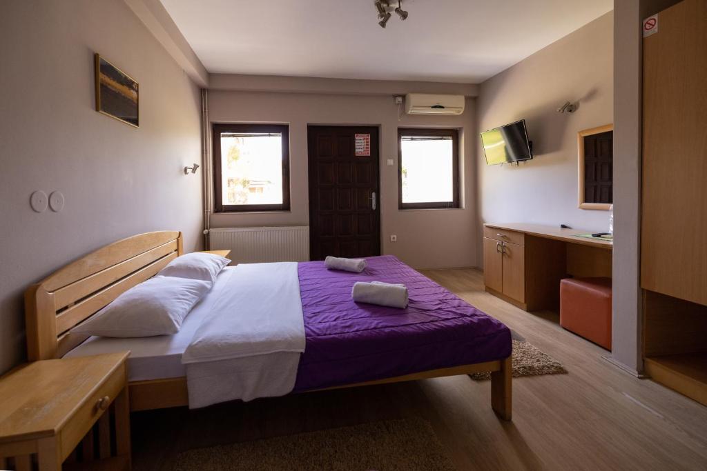 Postel nebo postele na pokoji v ubytování Kod Brke