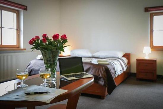 Posteľ alebo postele v izbe v ubytovaní Hotel Karczma u Macieja