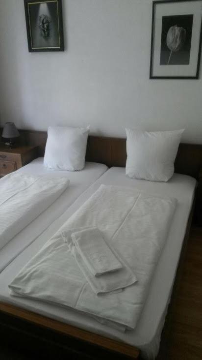 Postel nebo postele na pokoji v ubytování Gasthof Wabitsch