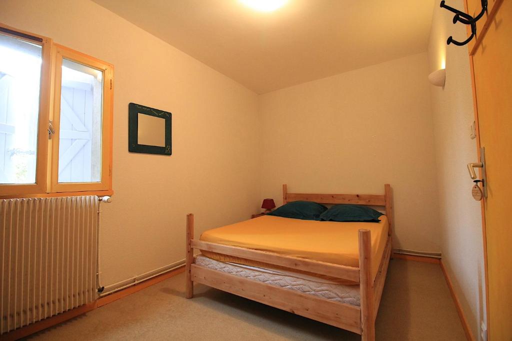 Postel nebo postele na pokoji v ubytování Maison Despourrins