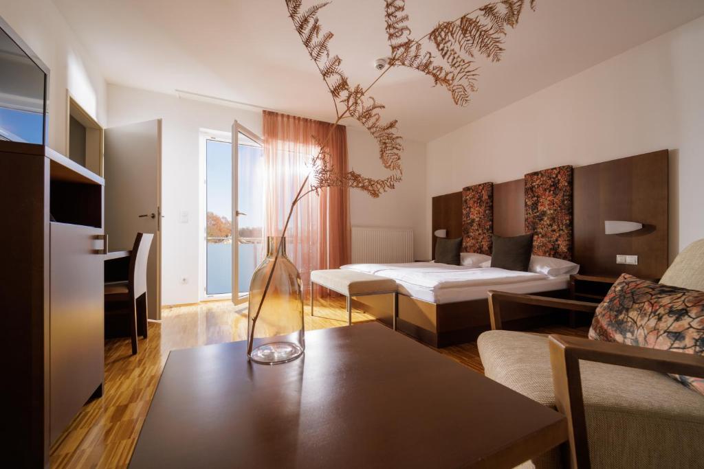 Postel nebo postele na pokoji v ubytování Hotel Garni Toscanina - Adults Only