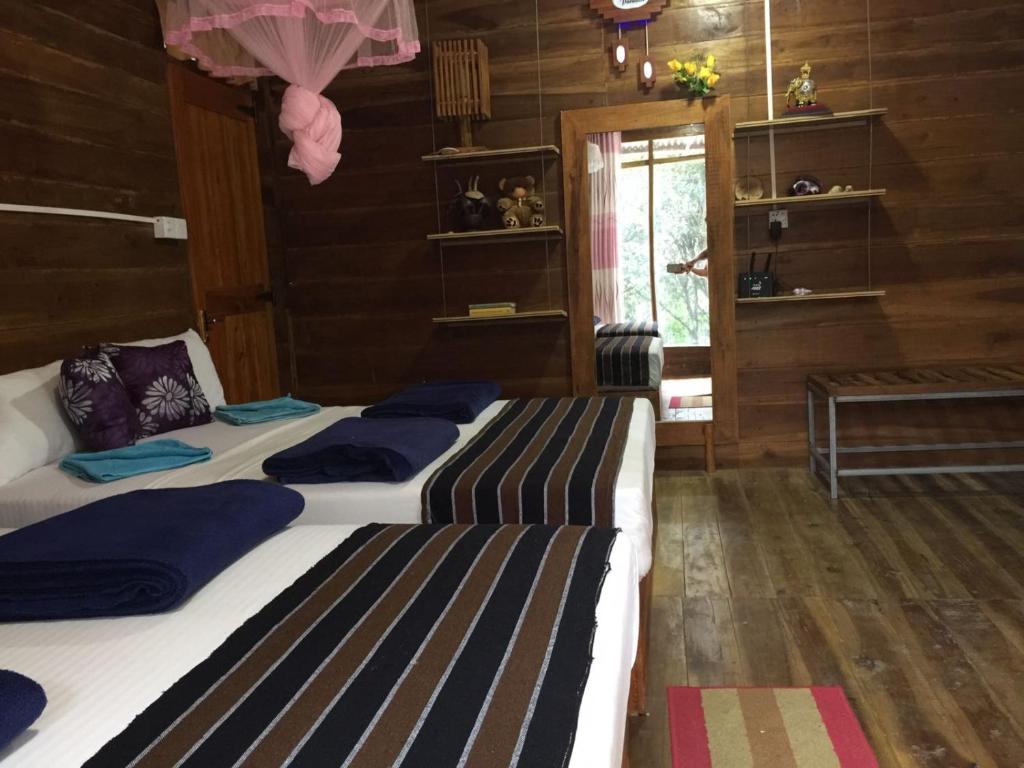 Postel nebo postele na pokoji v ubytování Ella nature nest