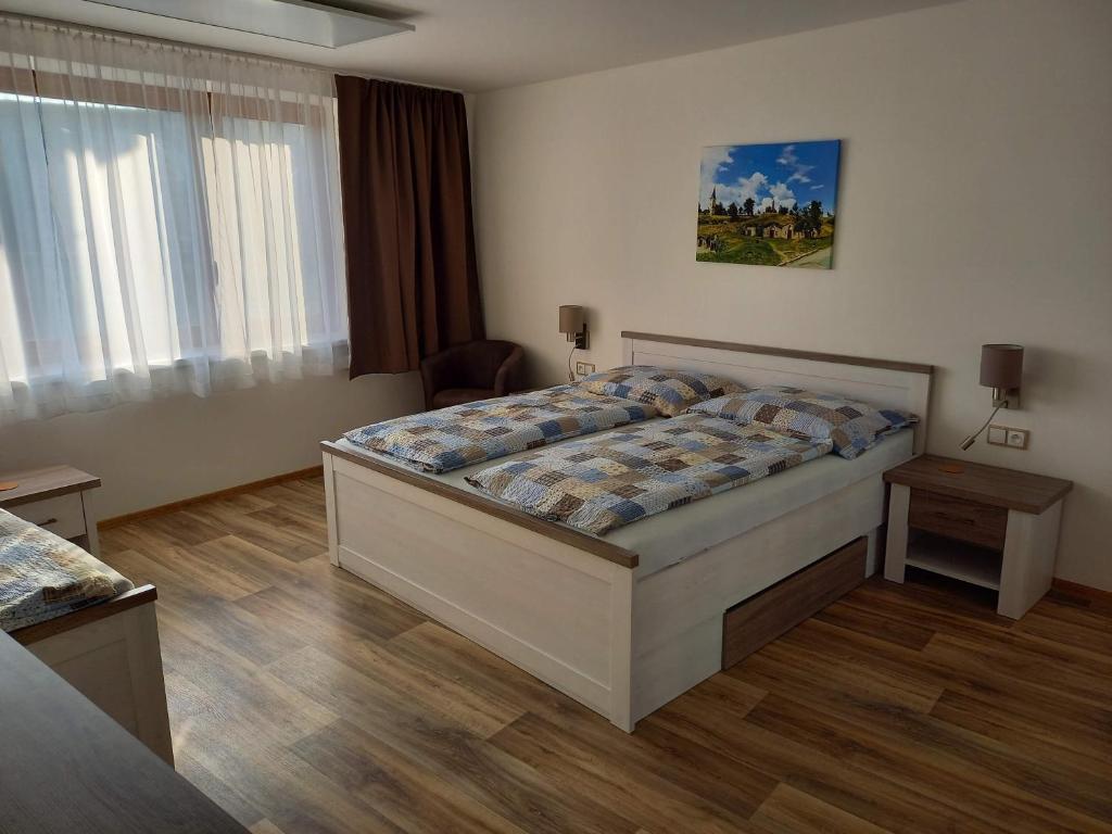 Postel nebo postele na pokoji v ubytování Apartmány 27