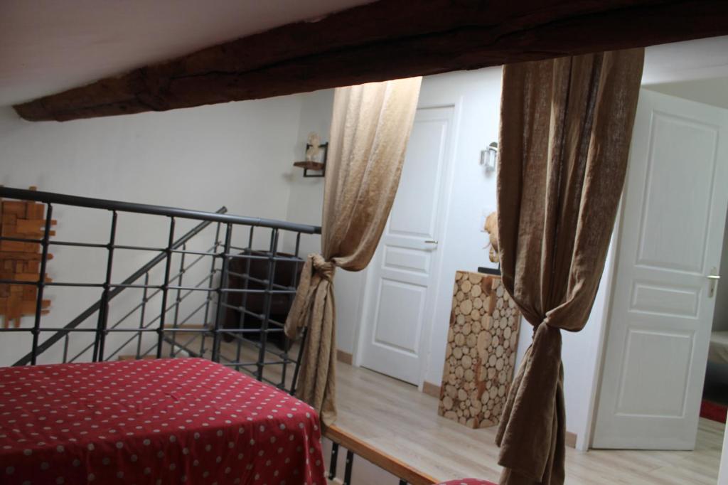 Postel nebo postele na pokoji v ubytování Les Trois Maisons