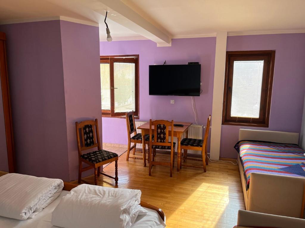 Rúm í herbergi á Apartments and Rooms Vicko