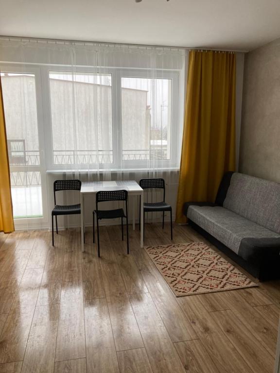 Posezení v ubytování Apartamenty W Domu
